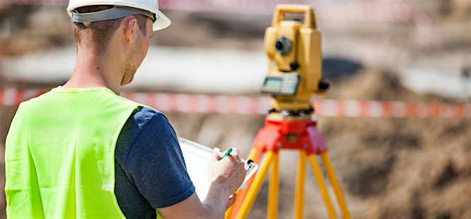 Man performing survey for title insurance