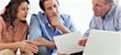 Realtor and clients discussing title insurance